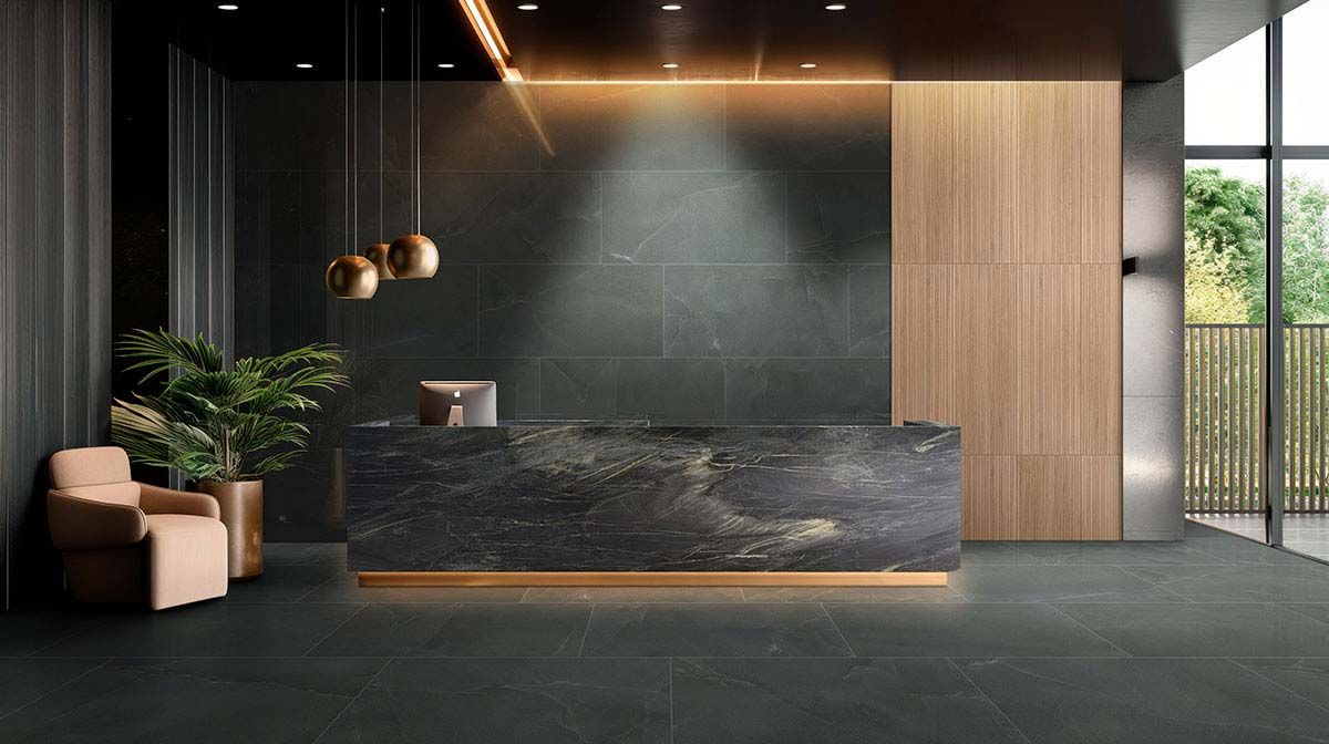 Lobby with a dark stone reception desk